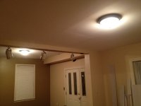 Center ceiling lights installed in foyer and front room - track lighting can now be removed